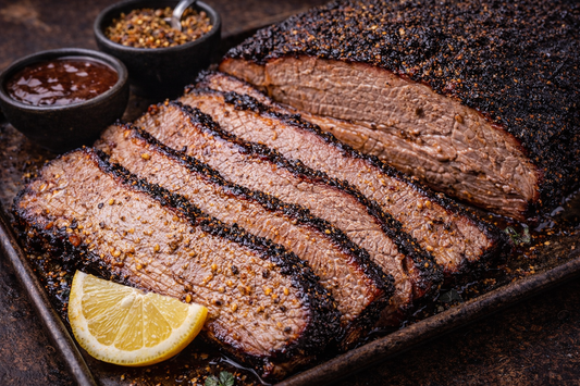 Smoked beef brisket with dark bark and sliced center seasoned with JK’s Brisket Rub