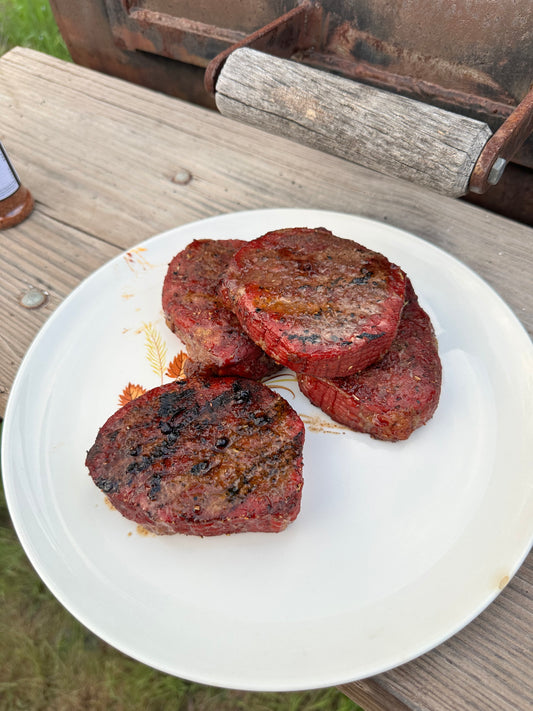 Steak seasoned with JK’s BBQ Pit Steak Seasoning grilled to perfection