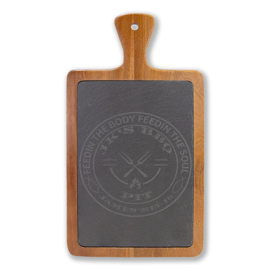 Wooden cutting board with a slate surface featuring branding on a white background