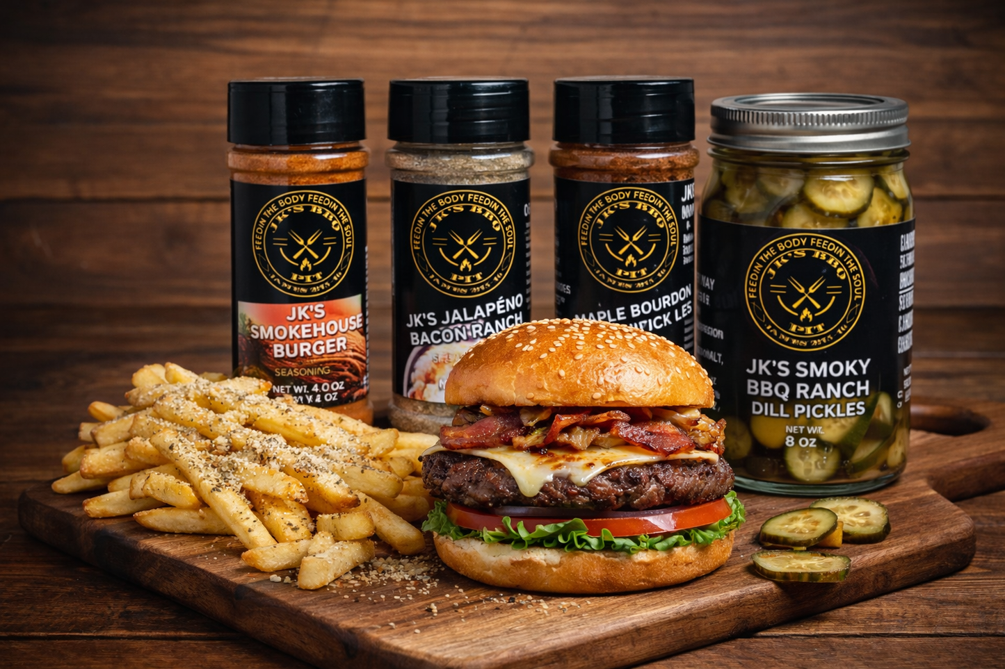 BBQ burger bundle meal with seasoned fries, smoked pickles, and JK’s BBQ Pit seasonings on a wooden board for grilling inspiration