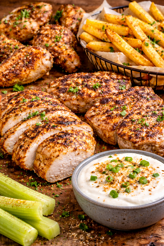 Grilled chicken and fries seasoned with JK’s Smoky BBQ Ranch Seasoning served with ranch dip