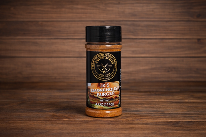 JK’s Smokehouse Burger seasoning 4 oz bottle on wooden background, smoky BBQ burger rub for burgers, fries, and grilling