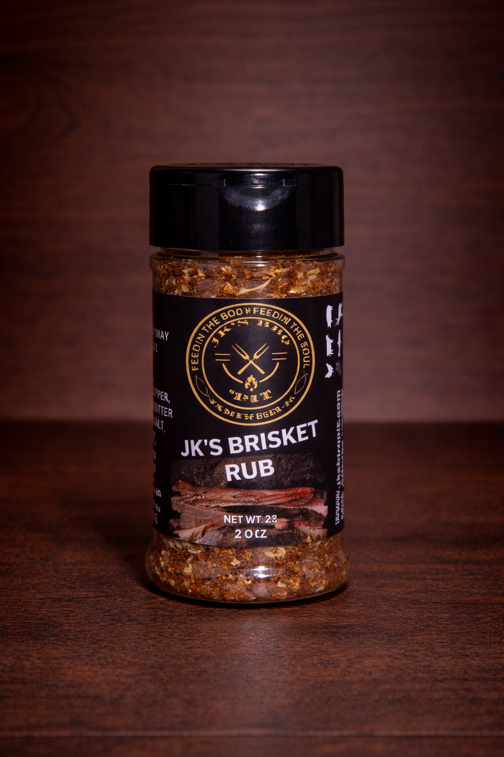 2 oz brisket rub seasoning for smoked brisket and beef – Texas-style BBQ rub by JK’s BBQ Pit on wood background
