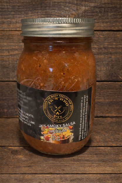JK's BBQ Pit Smoky Salsa Medium 16 oz jar on rustic wooden background with smoky tomato salsa visible in mason jar