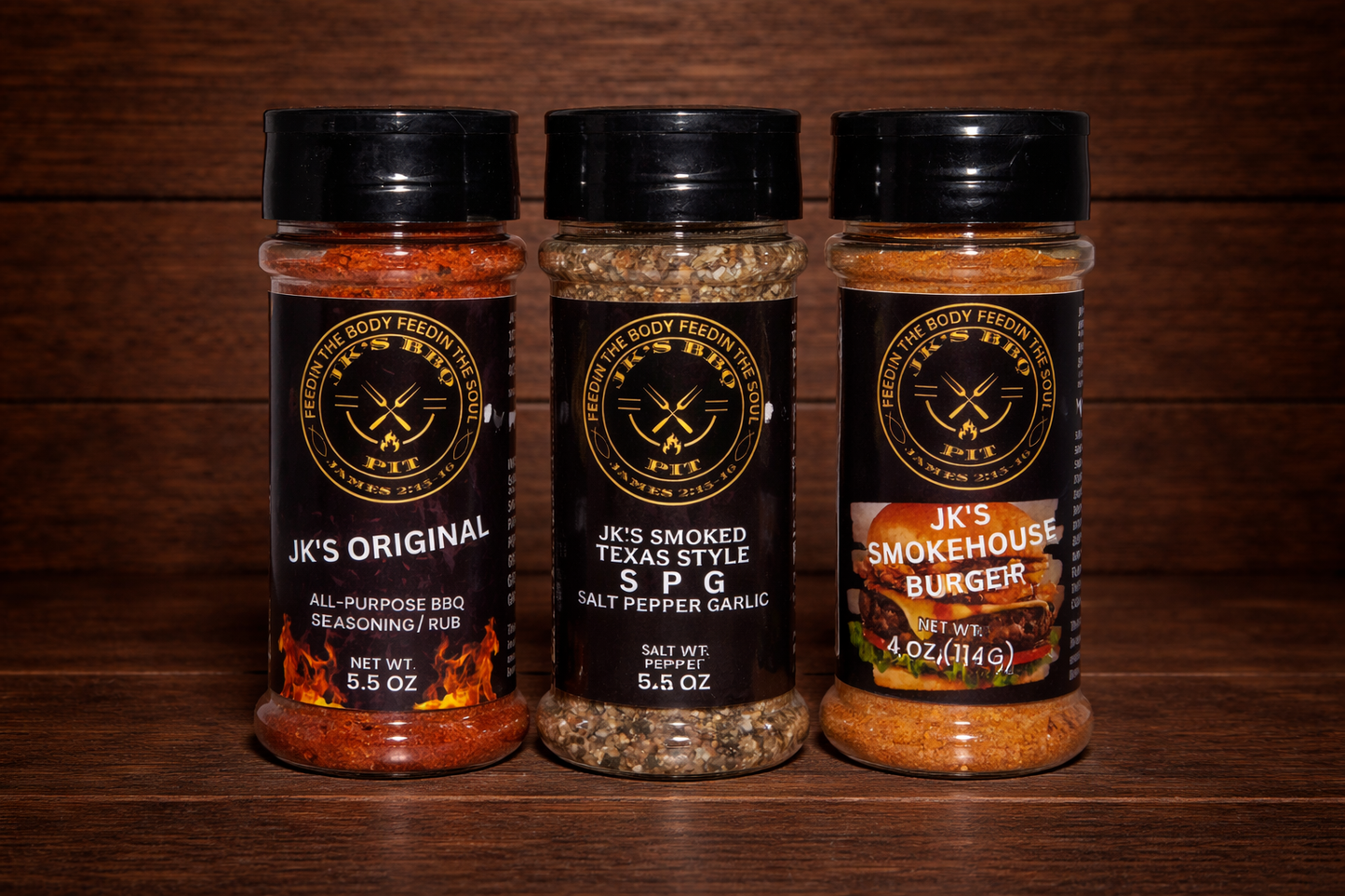 JK's BBQ Starter Bundle featuring Original BBQ Rub, Texas Style SPG, and Smokehouse Burger Seasoning on a rustic wooden table