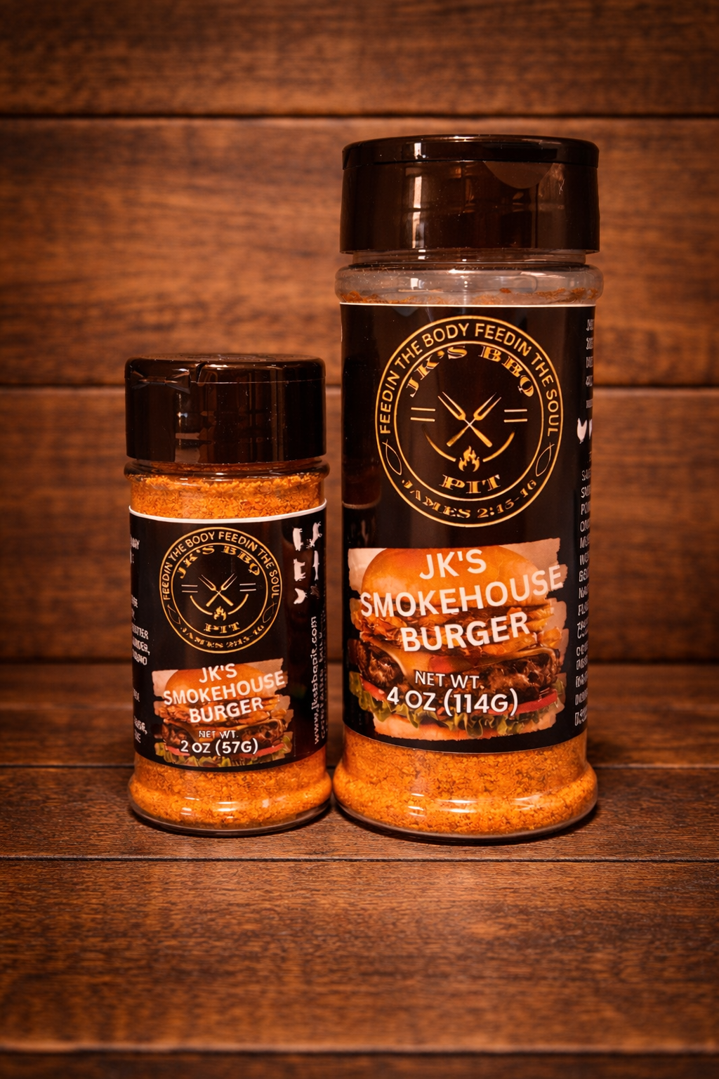 JK's Smokehouse Burger Seasoning 2 oz and 4 oz bottles from JK's BBQ Pit on rustic wooden table and wood wall background