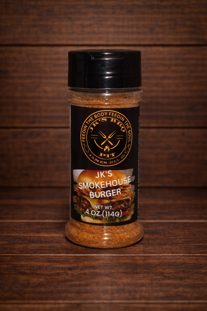 JK's Smokehouse Burger seasoning 4 oz bottle on dark rustic wooden table and wood wall background – smoky BBQ burger rub for smash burgers, grilled burgers, fries, and backyard grilling