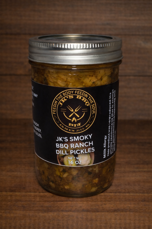 16 oz jar of JK's BBQ Pit BBQ Ranch Dill Pickles on rustic wooden background smoky ranch seasoned dill pickles