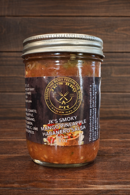 JK's Smoky Mango Pineapple Habanero Salsa jar on rustic wood background – sweet heat smoked salsa by JK's BBQ Pit