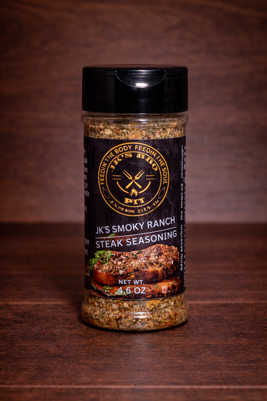 JK’s Smoky Ranch Steak Seasoning 4.5 oz bottle on wooden background with steak seasoning blend visible in clear jar
