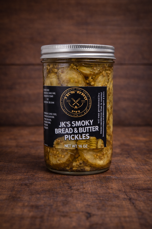JK’s Smoky Sweet Heat Pickles 16 oz jar smoked bread and butter BBQ pickles on wooden background
