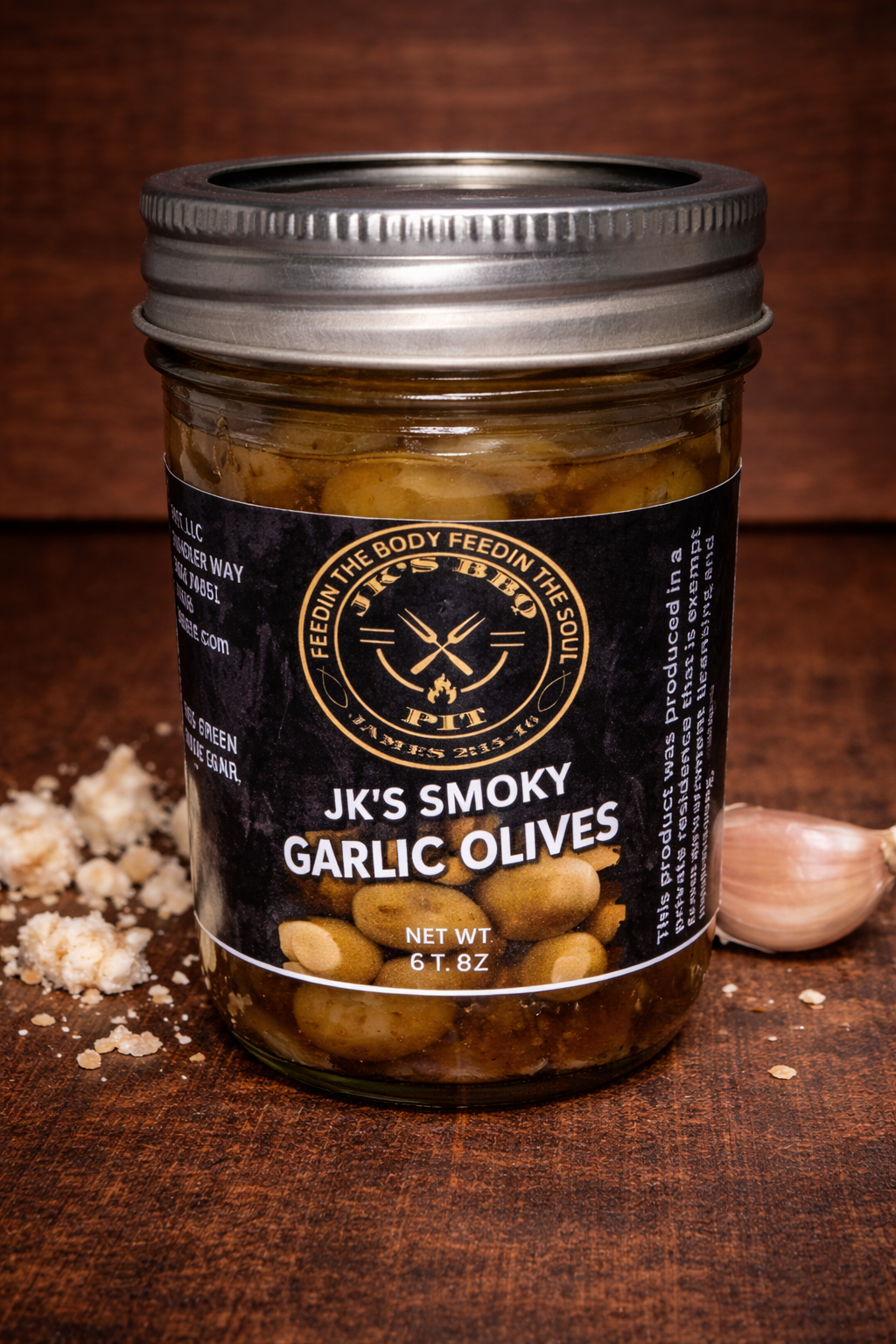 Smoked garlic olives in jar with rich savory BBQ flavor by JK’s BBQ Pit
