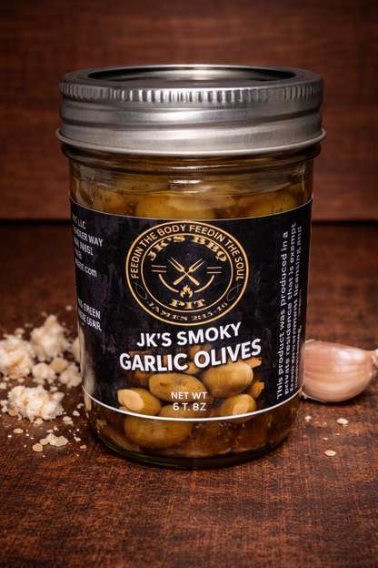 Smoked garlic olives in jar with rich savory BBQ flavor by JK’s BBQ Pit